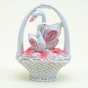 A Pair of Swan on a Flower Basket