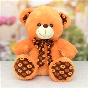 Brown Cute Teddy Bear With A Bow