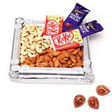 Send Dry Fruits & Chocolates Hamper with Diyas to India