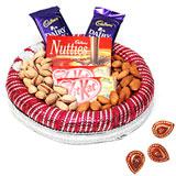 Send Cadbury Chocolates & Dryfruits Hamper with Diyas to India