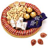 Send Palatable sweets, Dry Fruit & Chocolate Combo with Diyas to India