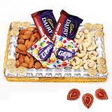 Send Delicious Chocolates & Dry Fruits Treat with Diyas to India