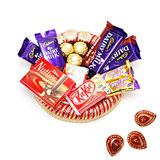 Send Mouth-watering Chocolates With Diyas to India