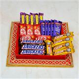 Send Chocolate Thali - Dairy Milk, Munch with Snickers in a Thali Thali to Kalyani Send Chocolate Thali - Dairy Milk, Munch with Snickers in a Thali Thali to Kalyani