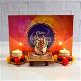 Send Cadbury Celebration & 2 Diya with Ganesha on Chowki Diwali Chocolate Hamper to Adalaj Send Cadbury Celebration & 2 Diya with Ganesha on Chowki Diwali Chocolate Hamper to Adalaj