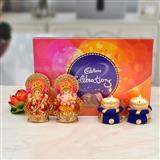 Send Cadburry Celebration, Mitti Laxmi Ganesh with 2 Purple Diya Diwali Chocolate Hamper to Ranoli Send Cadburry Celebration, Mitti Laxmi Ganesh with 2 Purple Diya Diwali Chocolate Hamper to Ranoli