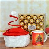 Send Ferrero Rocher with swirl Santa Cap and Mug Christmas Hampers to Kausani Send Ferrero Rocher with swirl Santa Cap and Mug Christmas Hampers to Kausani