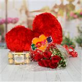 Send Love Cushion with Red Roses with Ferrero Rocher Flower Hampers to Ahmedabad Send Love Cushion with Red Roses with Ferrero Rocher Flower Hampers to Ahmedabad