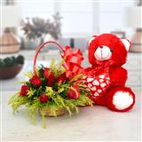 Send 12 Red Roses in a Round Basket with Teddy Flowers & Teddies to Elavur Send 12 Red Roses in a Round Basket with Teddy Flowers & Teddies to Elavur