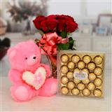 Send Pink Teddy With Ferrero Rocher & Roses In A Vase Gift Hampers to Umreth Send Pink Teddy With Ferrero Rocher & Roses In A Vase Gift Hampers to Umreth