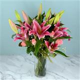 Send 12Pcs Rose with 21Pcs Lily in a glass Vase Flowers to Sangrur Send 12Pcs Rose with 21Pcs Lily in a glass Vase Flowers to Sangrur
