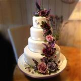 Send 4 Tier Vanilla Cake Decorated With Flower 4kg Cakes to Kharar Send 4 Tier Vanilla Cake Decorated With Flower 4kg Cakes to Kharar
