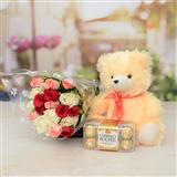 Send Ferrero Rocher With Teddy & 18 Multicolor Roses Gift Hampers to Madurai Send Ferrero Rocher With Teddy & 18 Multicolor Roses Gift Hampers to Madurai
