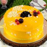 Send Round Designer Mango Flavor Cake 1Kg Cakes to Waghodia Send Round Designer Mango Flavor Cake 1Kg Cakes to Waghodia
