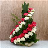 Send Swirling Red and White Carnations Basket Flowers to Junagadh Send Swirling Red and White Carnations Basket Flowers to Junagadh