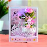 Send Showpiece of Flowers in a Cycle With LED Home Decor to Igatpuri Send Showpiece of Flowers in a Cycle With LED Home Decor to Igatpuri