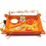 Send Orange Thali with 3 Rakhis to India