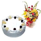 Send Mixed flowers and 1/2 Kg pineapple cake to Mumbai