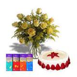 1/2 Kg Strawberry Cake with 12 Yellow Roses and Temptation Bar Hamper