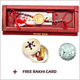 Send 22K Gold Ganesh Rakhi with Free Silver Coin to Usa
