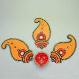Traditional Rangoli With a Diya