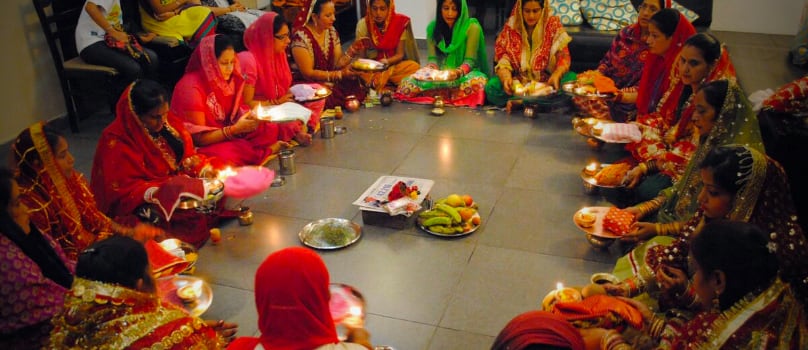 Ladies Performing Karwa Chauth Puja Ladies Performing Karwa Chauth Puja