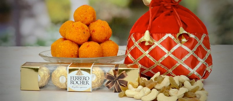 Red Potli Ladoo Ferrero Dry Fruits Red Potli Ladoo Ferrero Dry Fruits